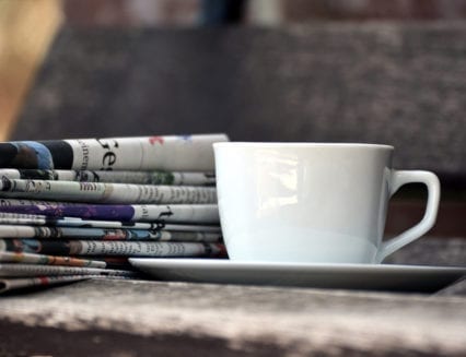 How can newspapers build trust?