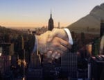 hands shaking overlaid on new york city skyline