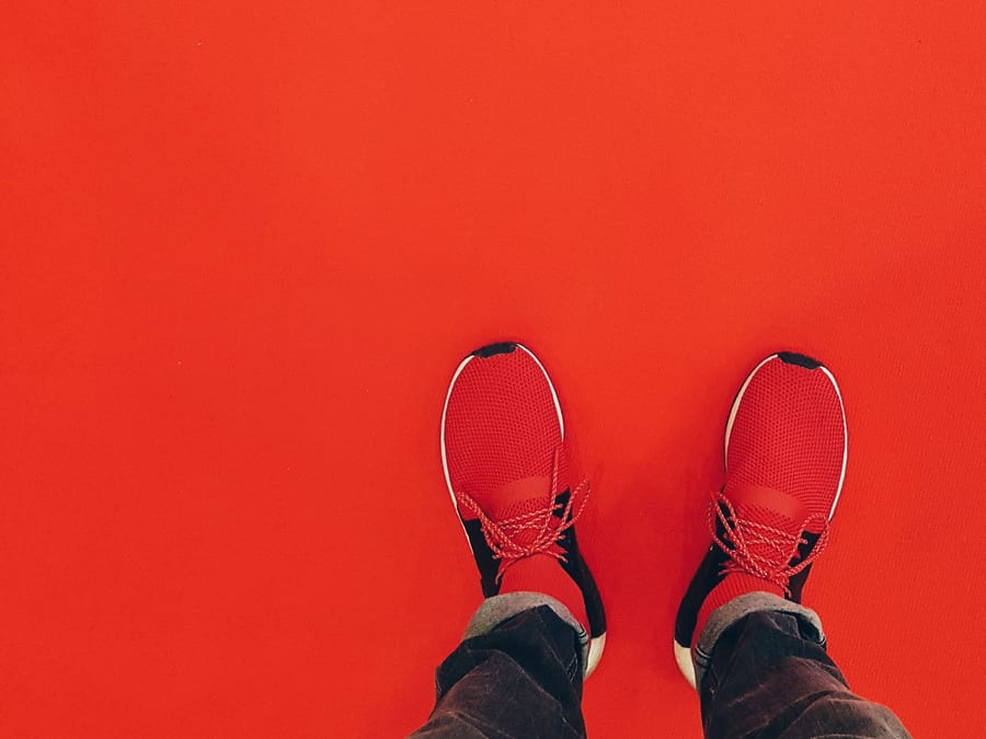 red shoes on red background