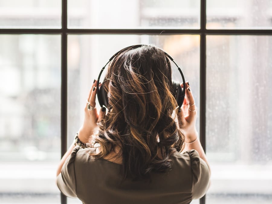 woman with headphones on