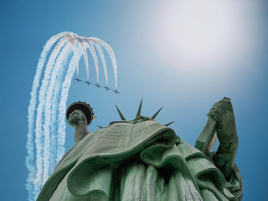 jets flying over statue of liberty