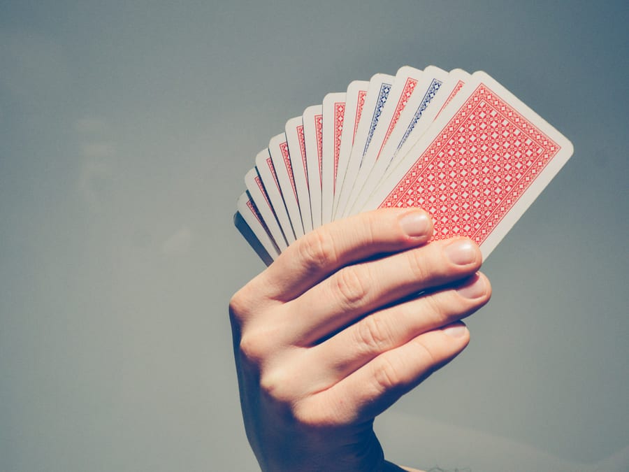 hand holding cards