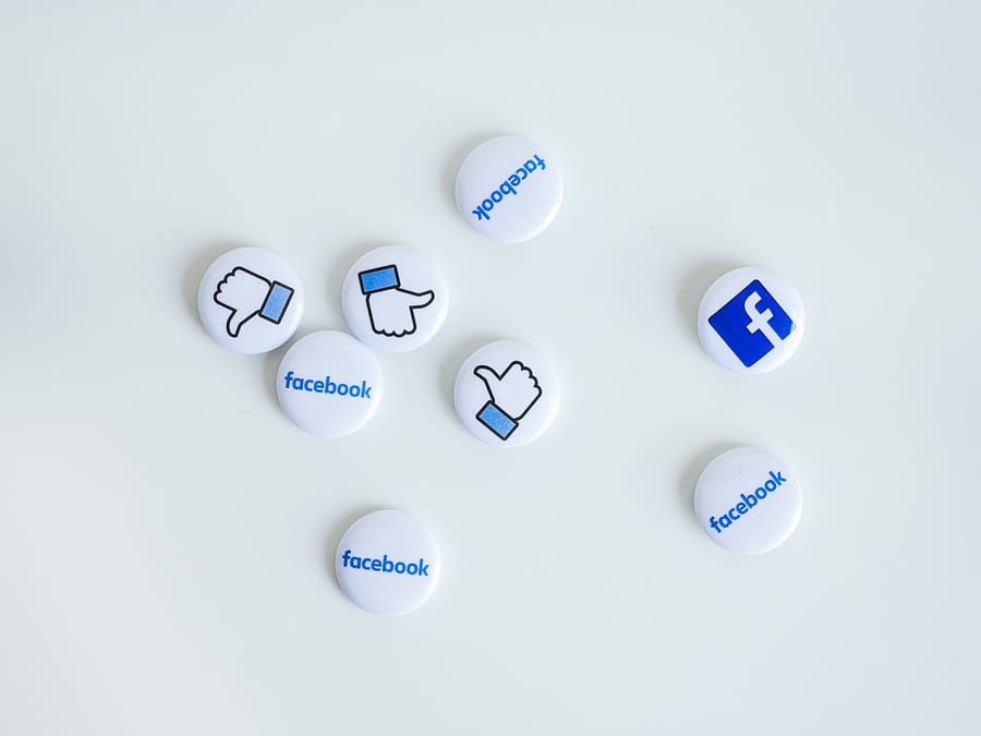 pins with facbook logo